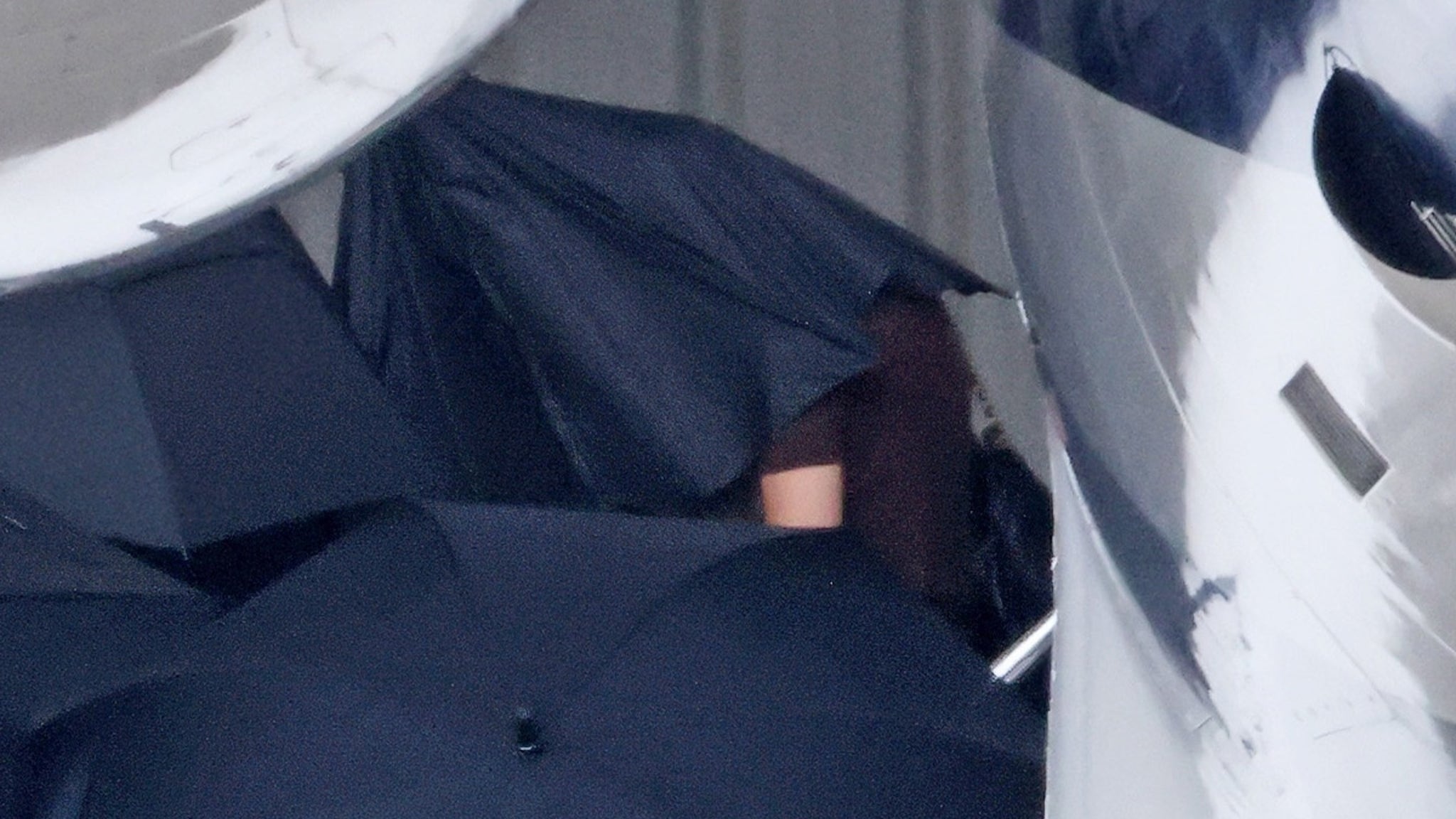 Taylor Swift Covers Up with Umbrellas at Selena Gomez’s Wedding Taylor Swift Covers Up with Umbrellas at Selena Gomez’s Wedding