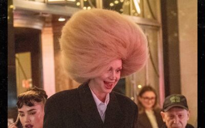 Massive Wig Makes Gwendoline Christie’s Cab Entry Challenging