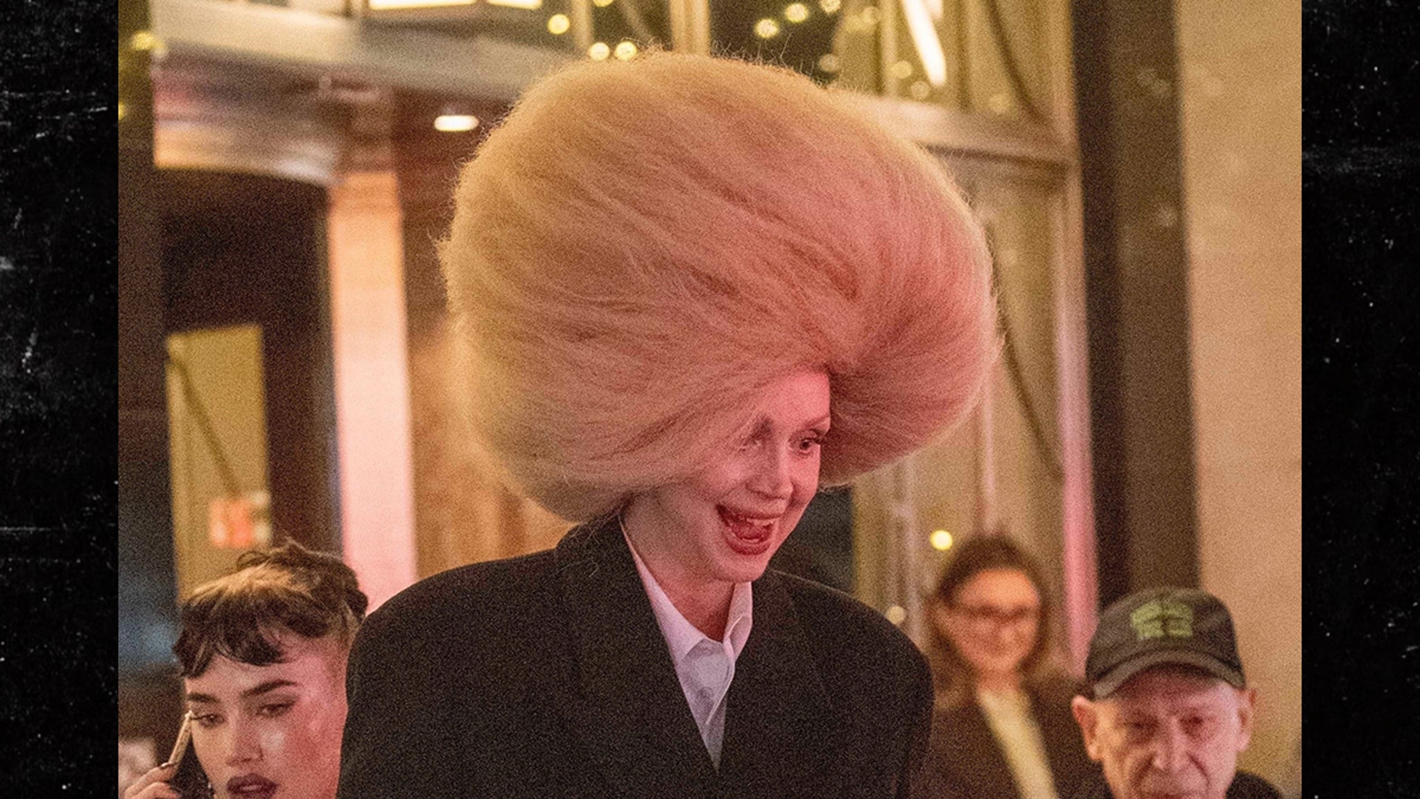 Massive Wig Makes Gwendoline Christie’s Cab Entry Challenging