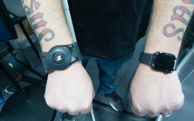 Haptic Wristband Decodes Facial Expressions with Meta Glasses