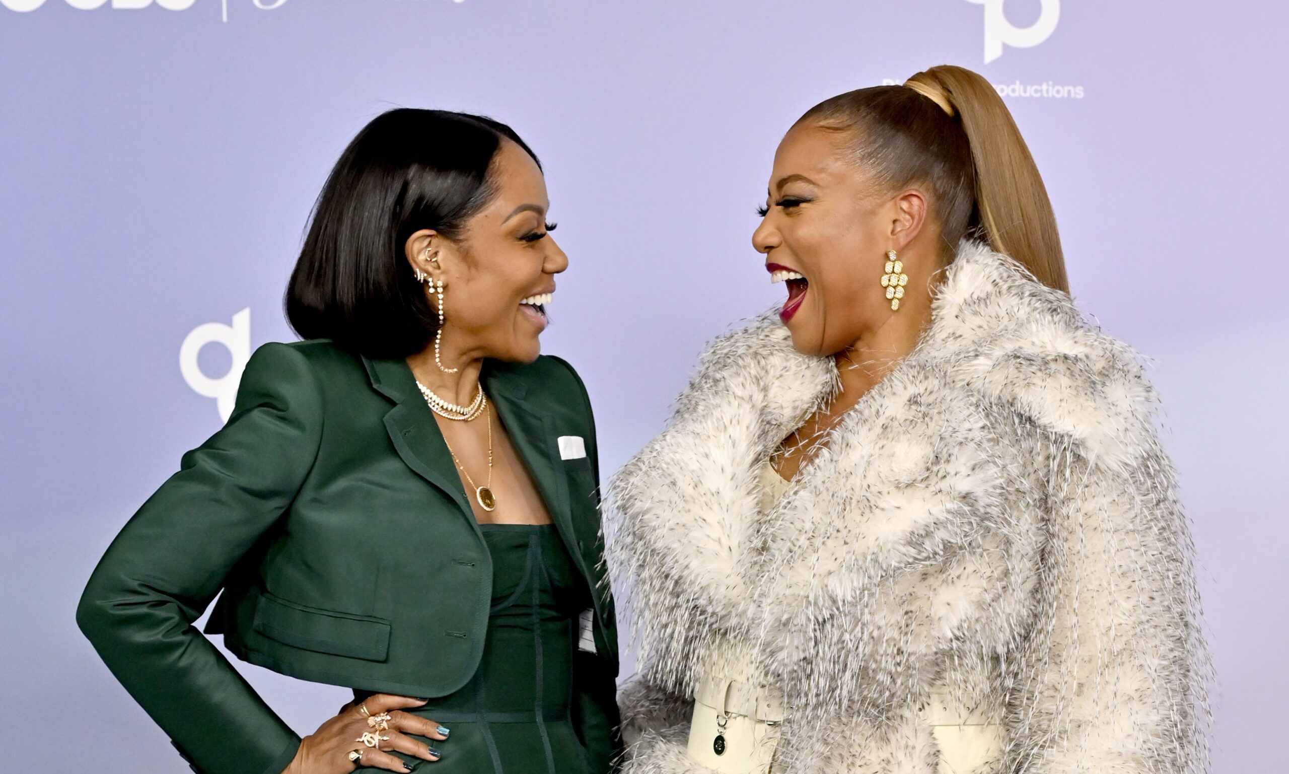 Queen Latifah Goes Viral After AMAs with Son and Partner