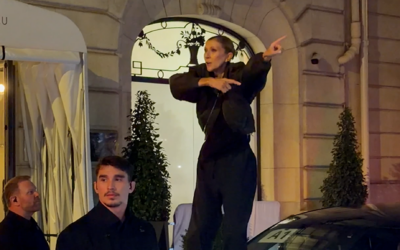 Barefoot Celine Dion Sings on BMW Roof After Paris Show